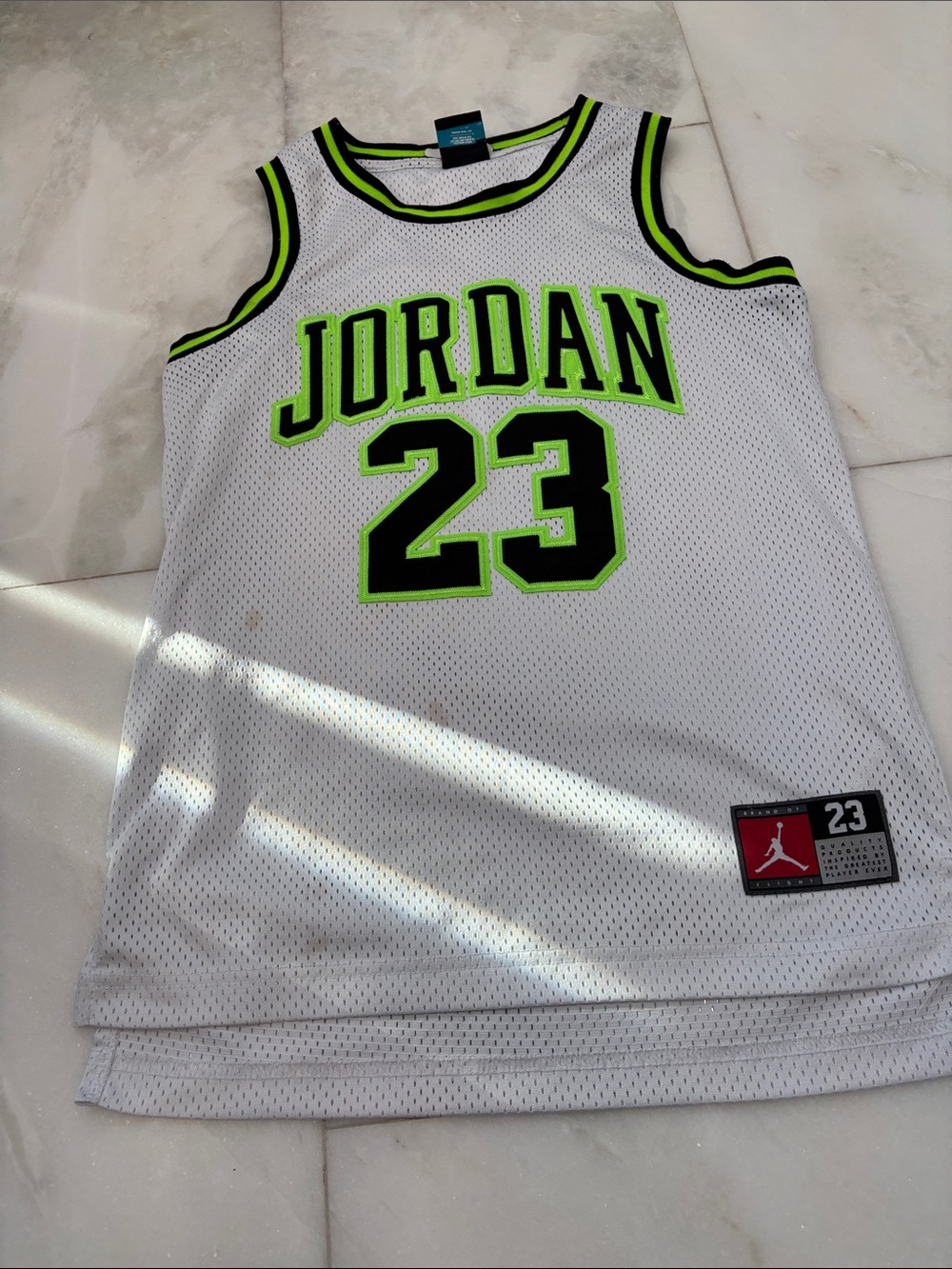 White / neon green Jordan basketball jersey